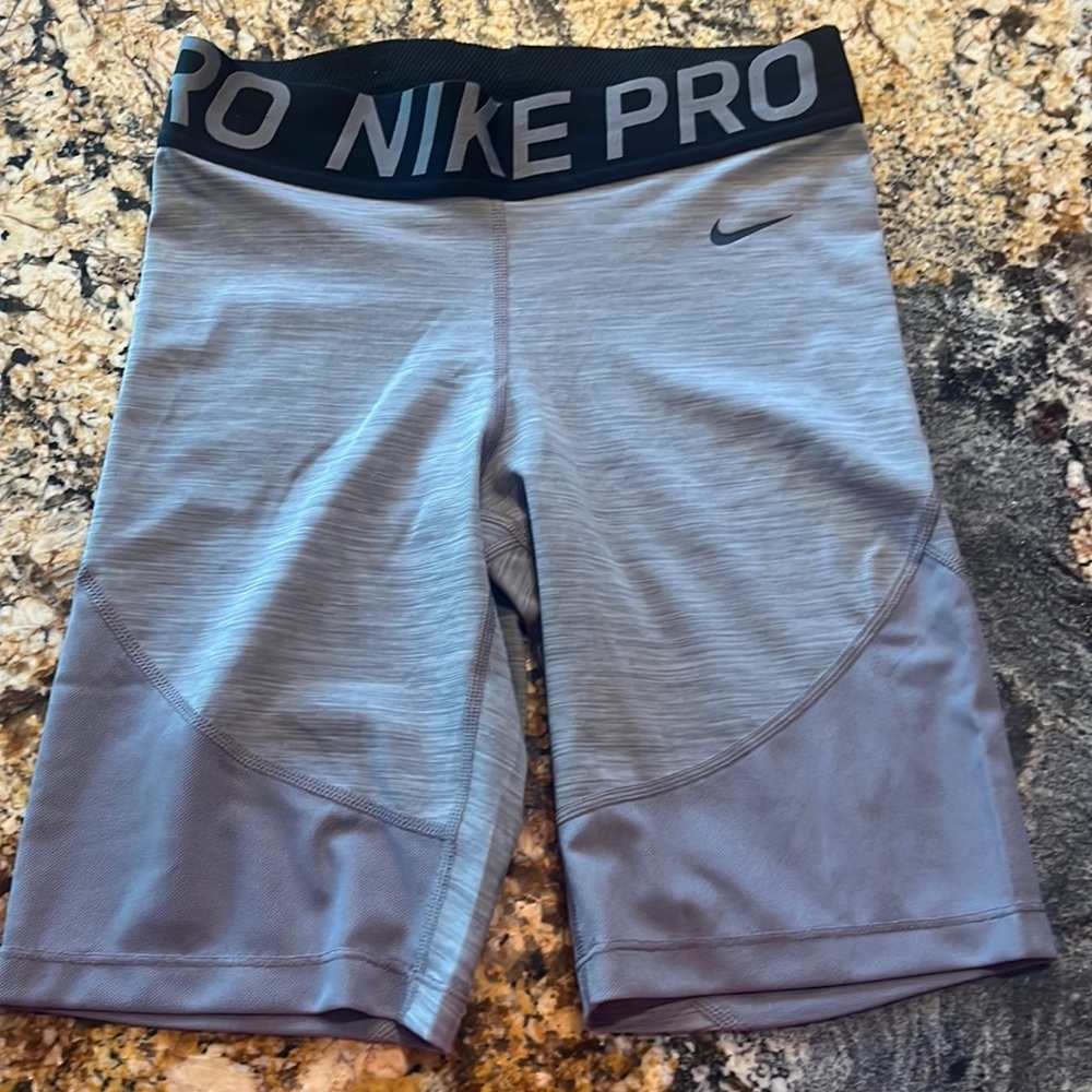 These are Nike Pros in a womens small, never worn but, the tag is off.